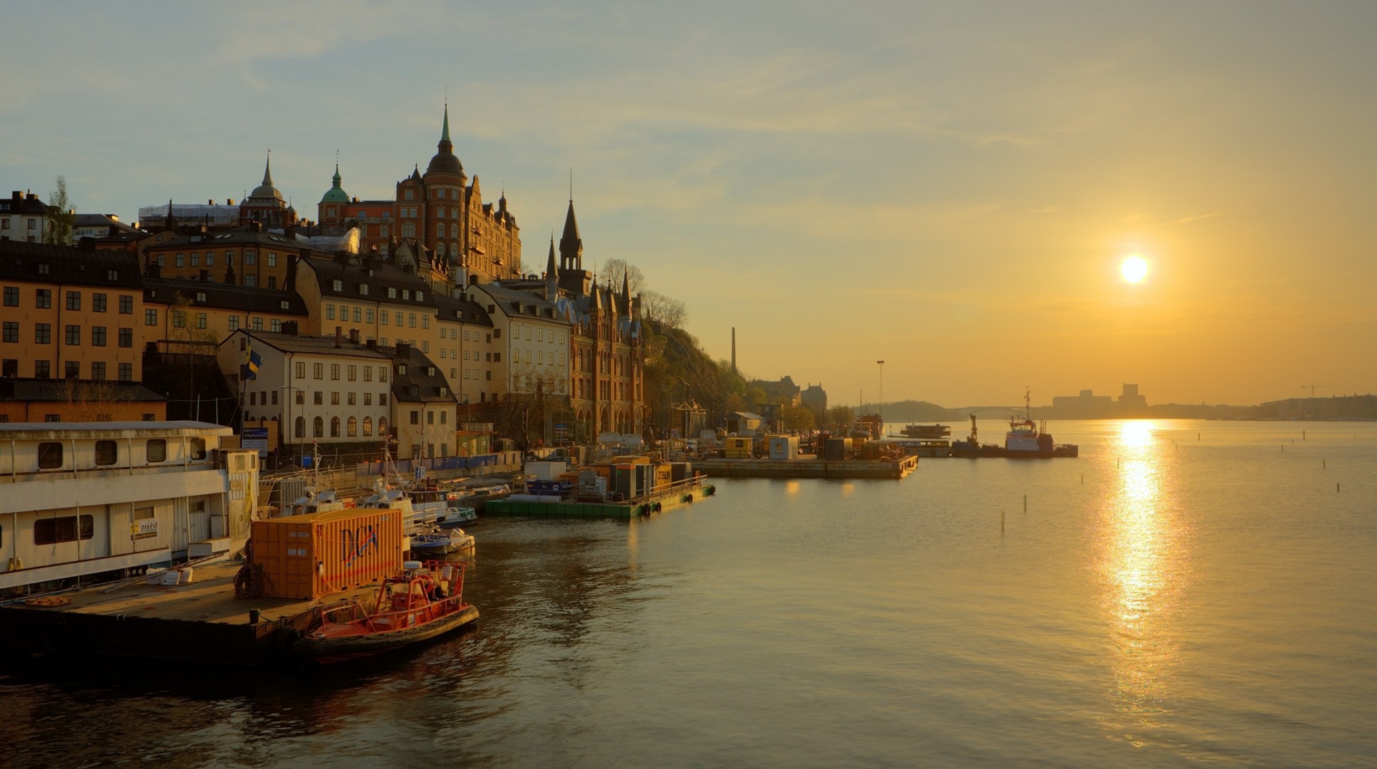 tower river sky reflection fog sweden water sun sunrise stockholm spiers boat path gold embankment house