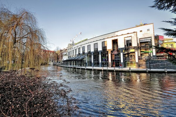 A building on the shore of a lake in Amsterdam