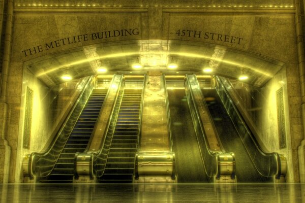 Image of escalators in golden light