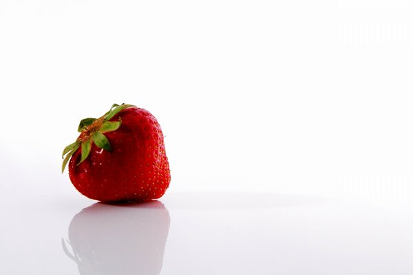 Red strawberries on a white background