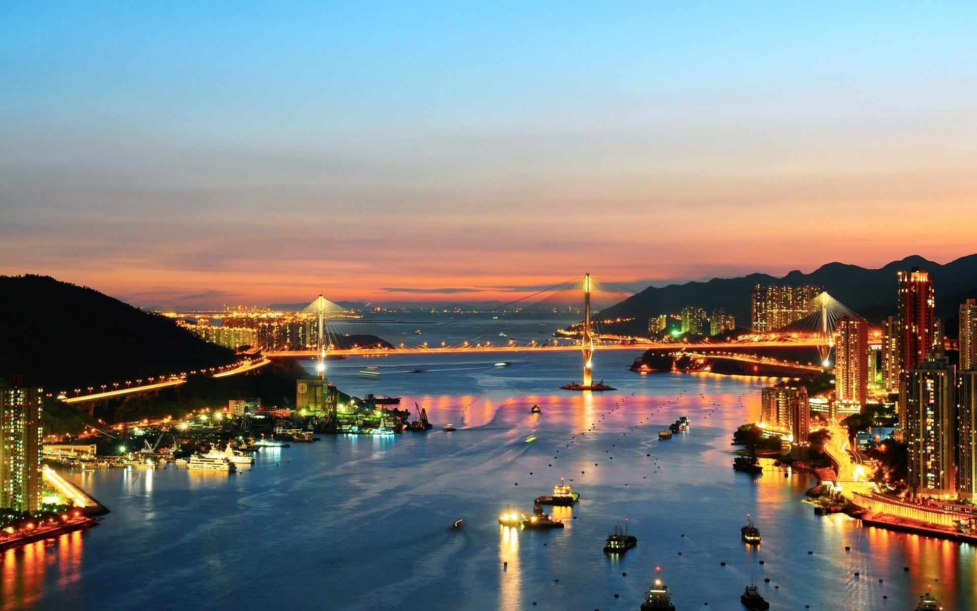 luces puesta de sol puente ciudad noche cielo mar barcos estrecho