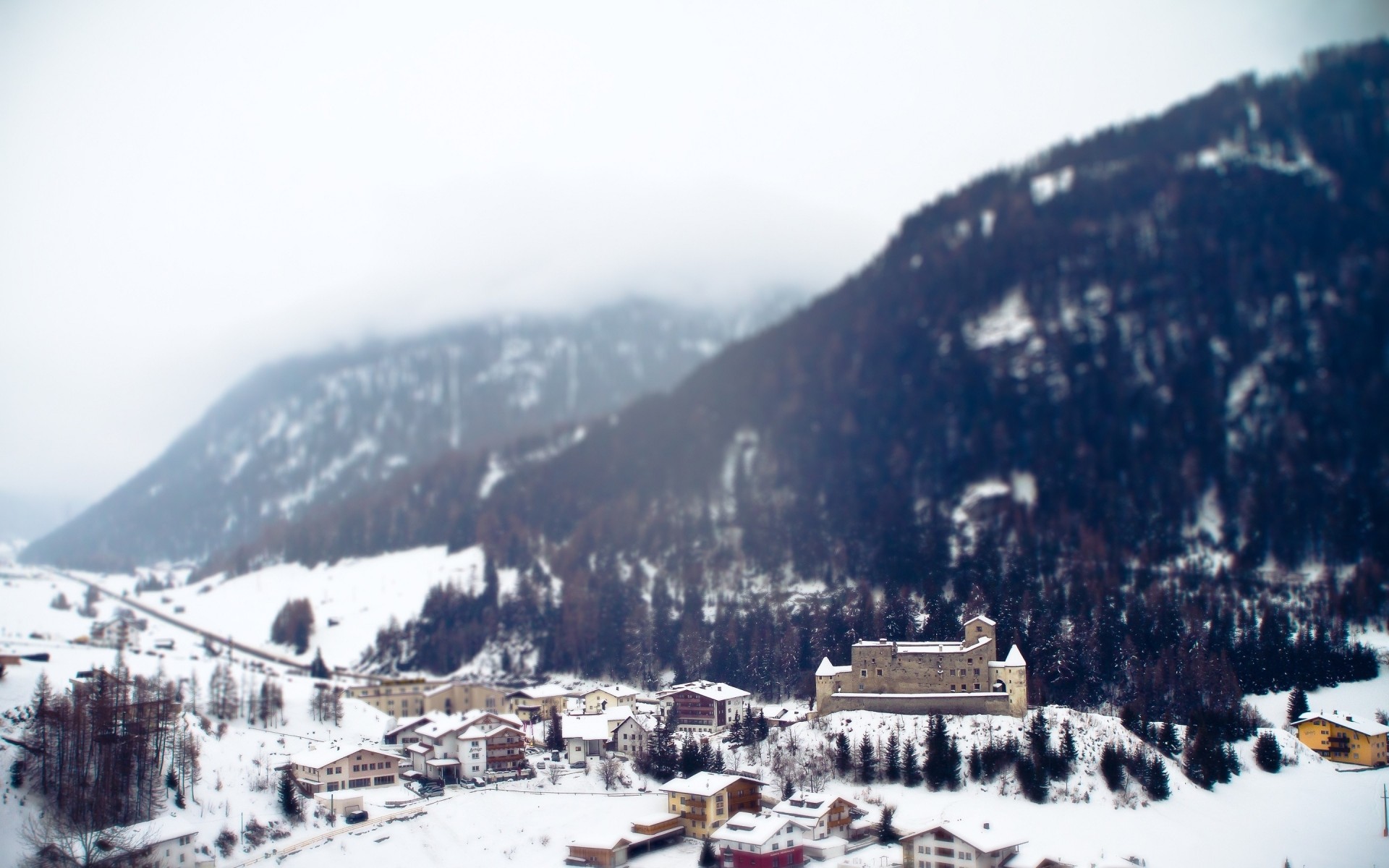 alps tilt-shift town snow mountain winter