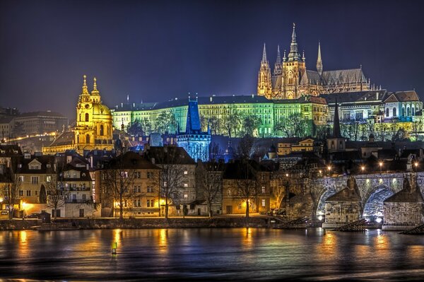 A glowing city reflected in the river