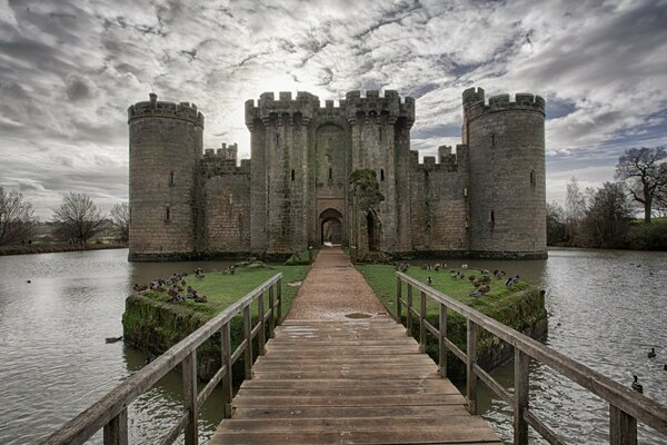 Bridge to the castle on an island surrounded by water