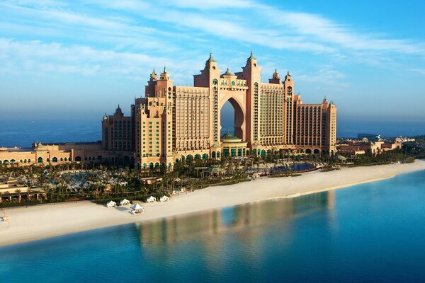 A huge building on the shore of the azure ocean