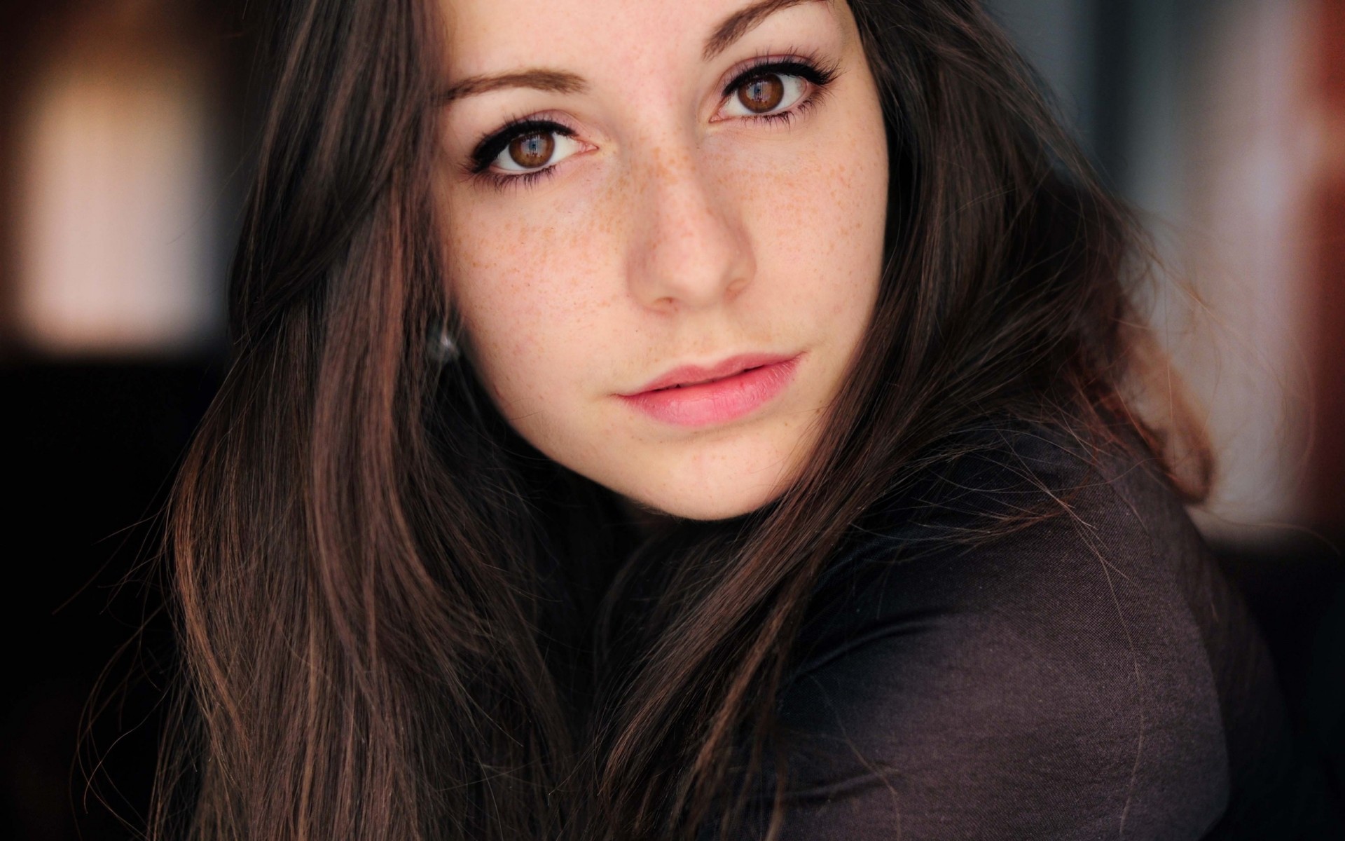 a woman girl brunette black model close up face