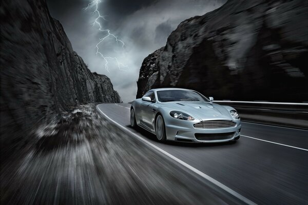 Cool gray car on the road lightning