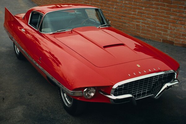 Elegante Ferrari rojo sangre para los conocedores de los clásicos