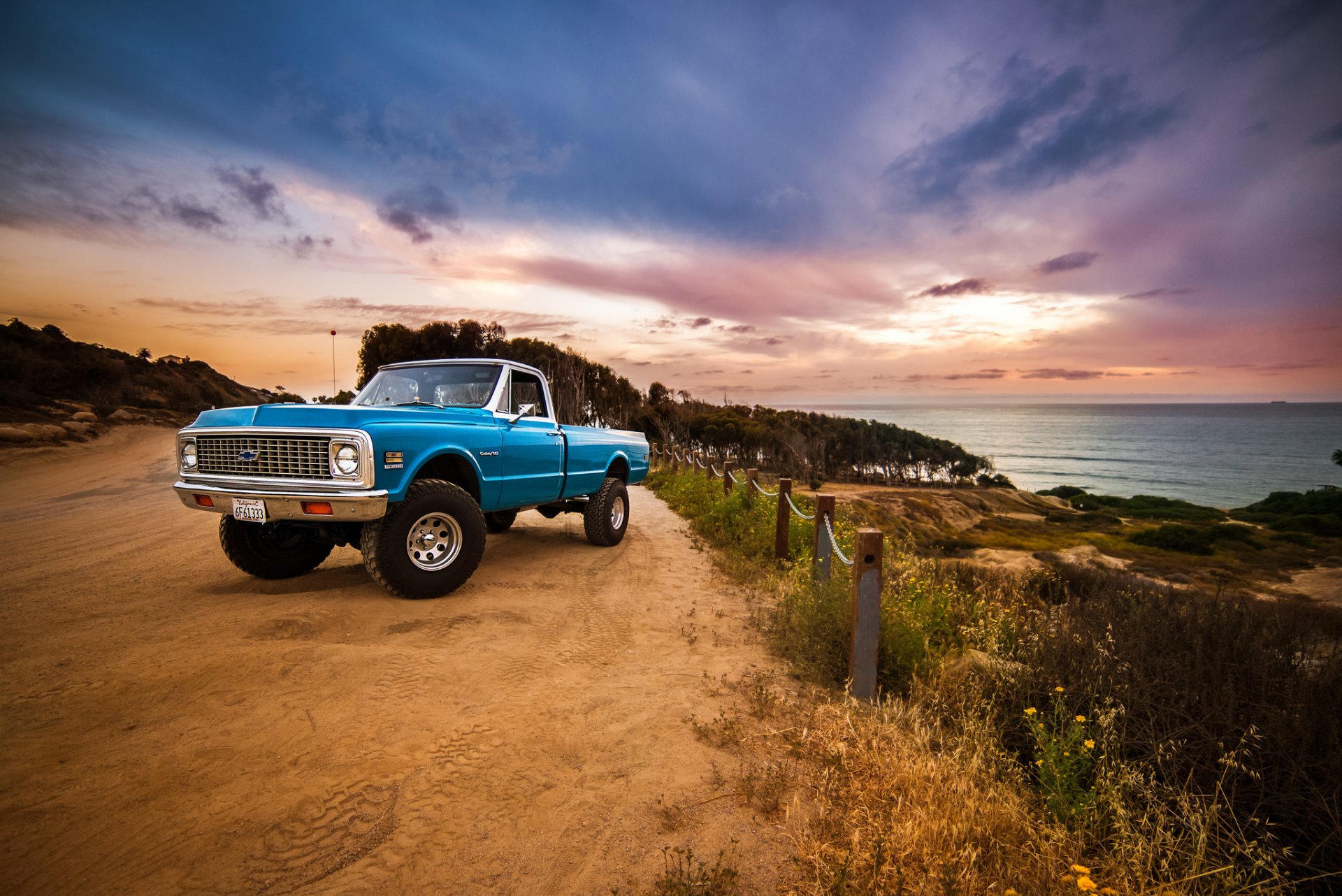 chevrolet 1972 party front wheel road fence sea clouds sky sunset