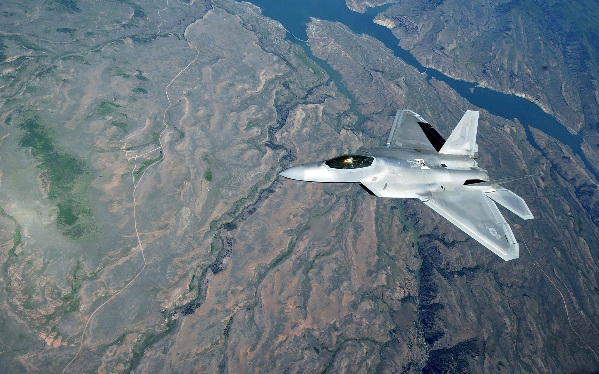 f-22 gris avión