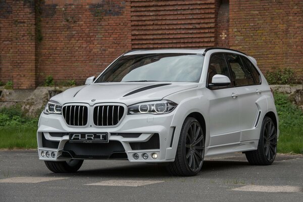 White BMW car in the parking lot