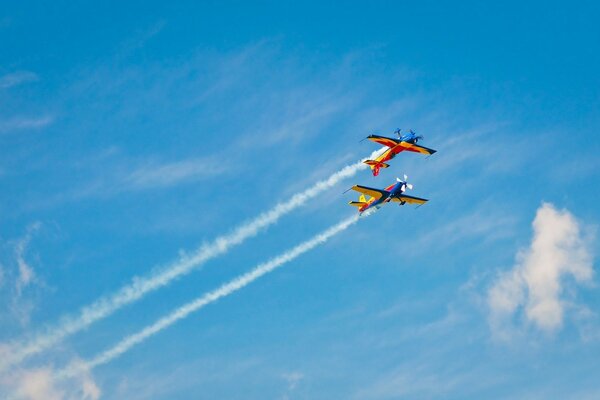 Two planes in the sky against the background of clouds