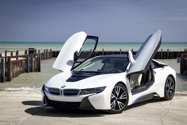 Sports car on the pier by the sea