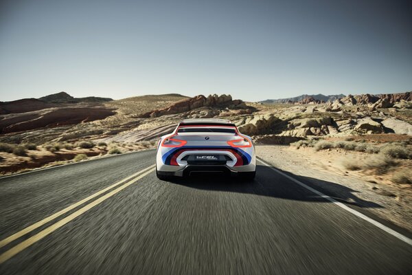 BMW sports car rushes down the road