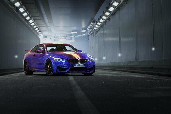 Purple racing BMW in the tunnel