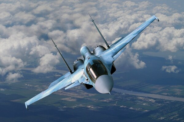 The Su-35 fighter is in flight