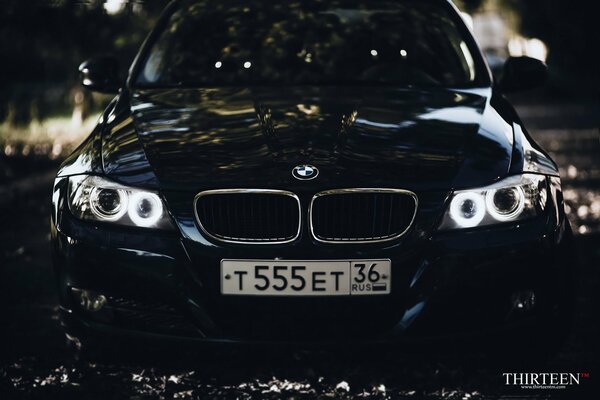 Thirteen photos of a black BMW