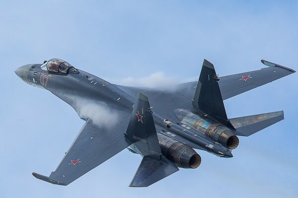 Supermaneuverable Su-35 jet at a training demonstration