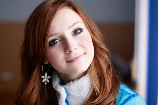 Red-haired girl with brown eyes