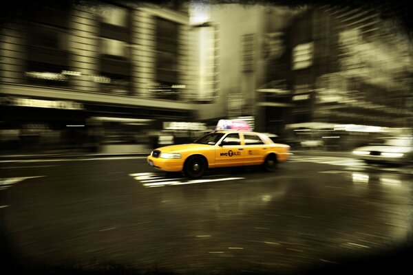 Dynamic photo. Taxis on the move in New York