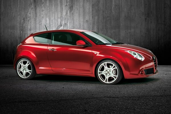 Red alfa Romeo on a gray background