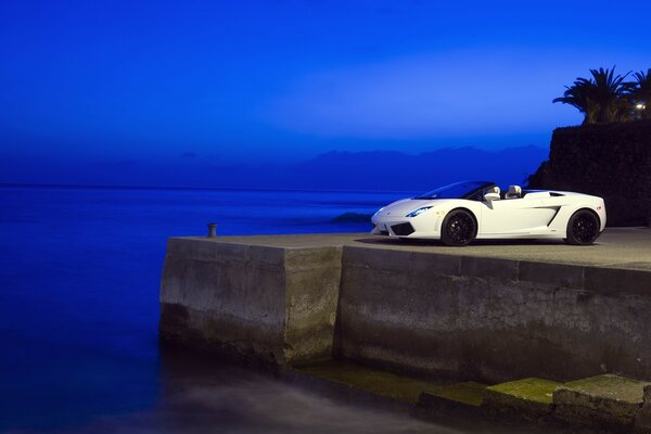 A white sports car spoils. beautiful view