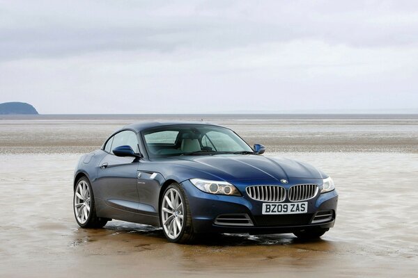 BMW car on the sand , where it belongs