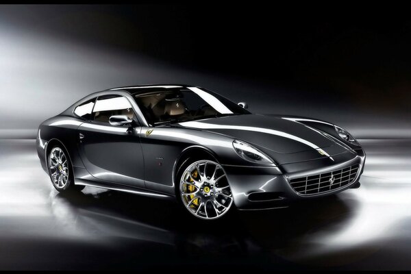 Black ferrari one-on-one staglietti on a dark background