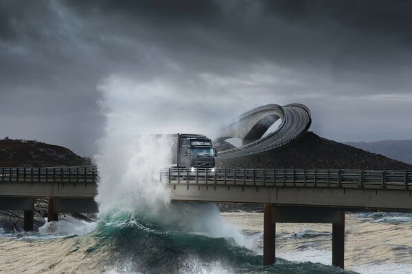 The truck was covered by a wave on the overpass