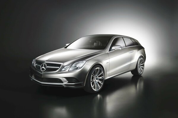 Silver Mercedes-benz on a gray background
