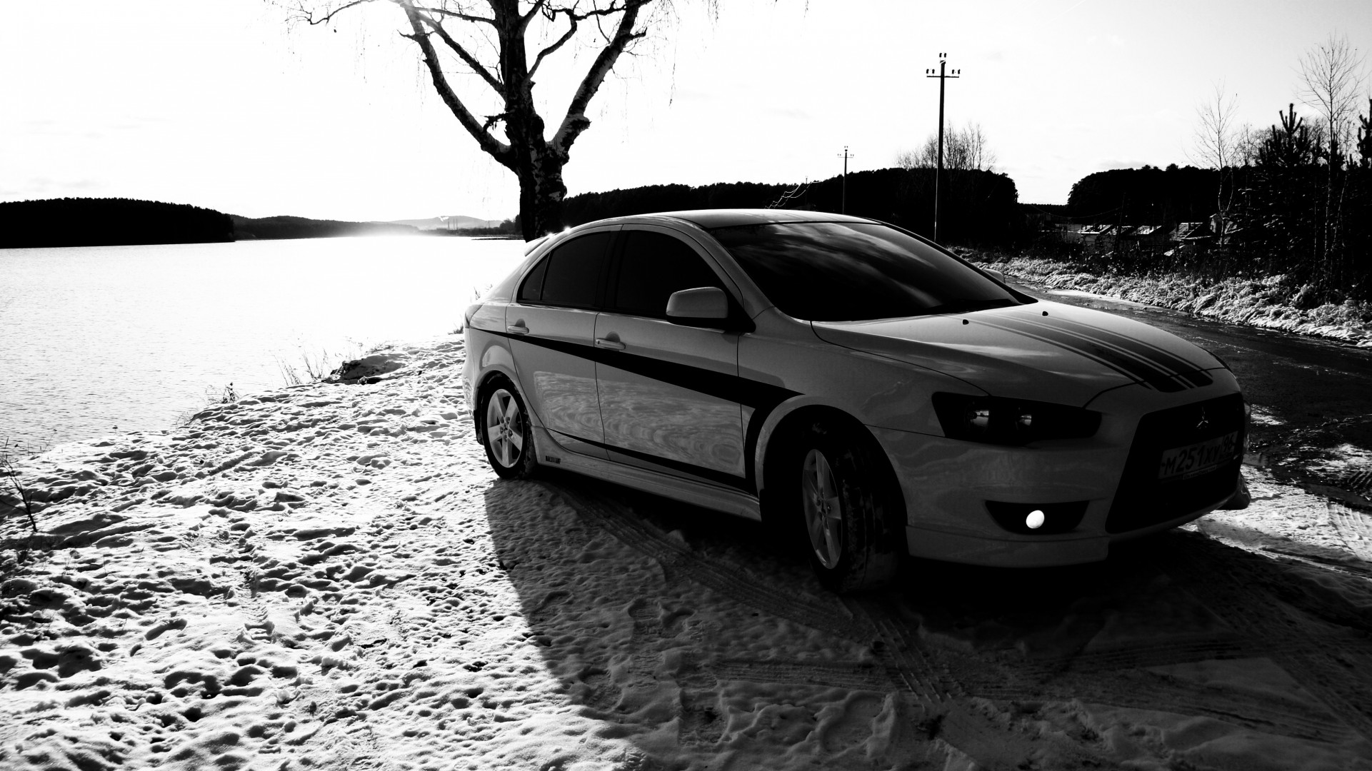 mitsubishi profesión x10 blanco y negro nieve madera huellas