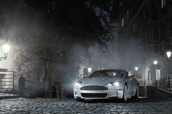 Aston Martin on a foggy night street