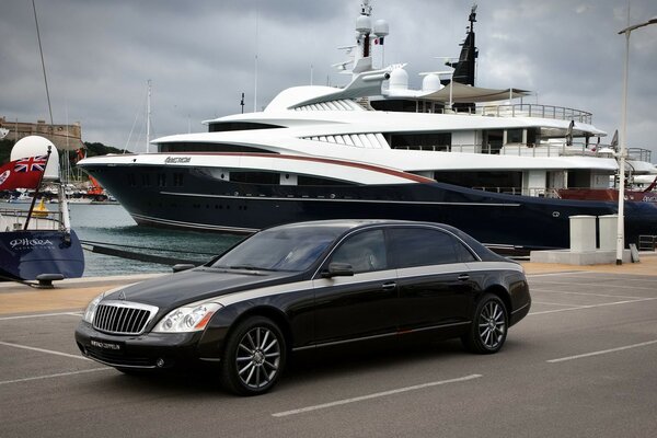 Maybach zeppelin rides along the road along the seashore