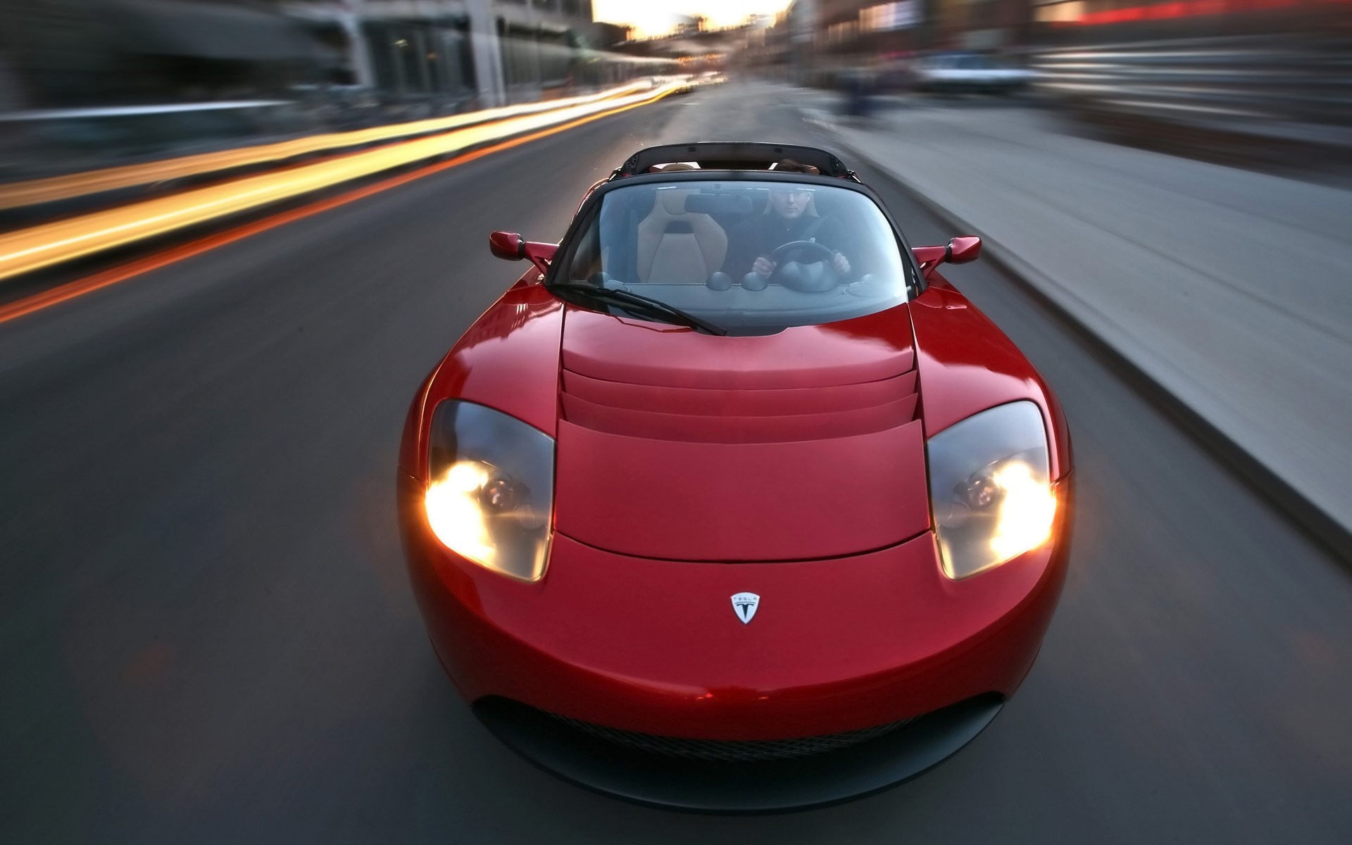 tesla roadster red road speed men