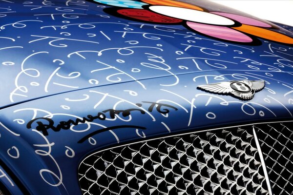 Blue bentley with autograph and flower