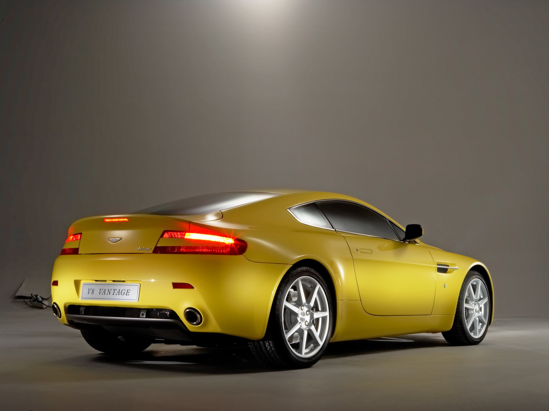 aston martin v8 vantage yellow