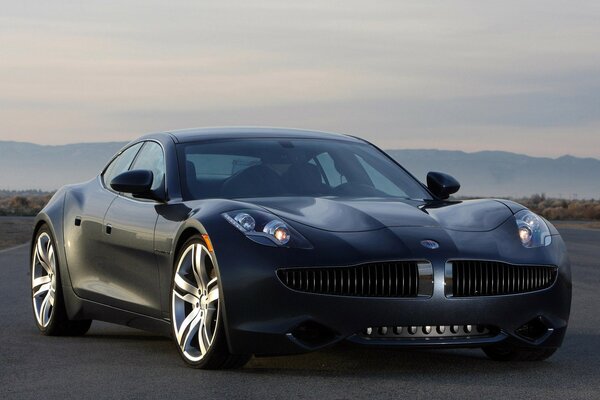 Fisker karma car on the road