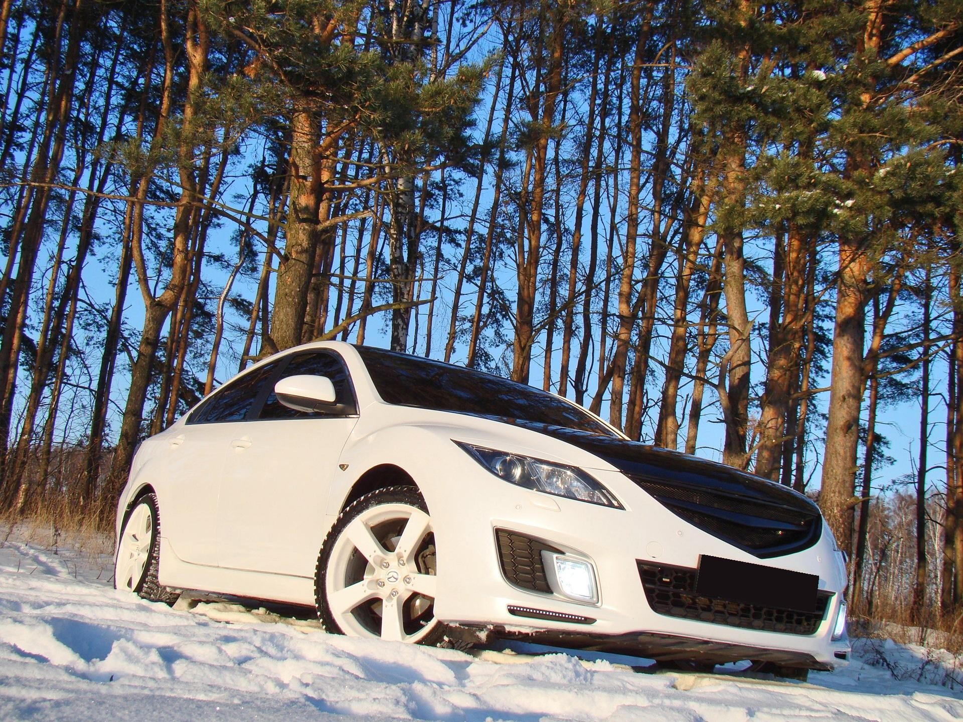 mazda 6 neige arbres