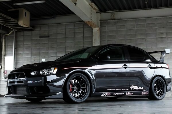 Car Black spoiler in the hangar