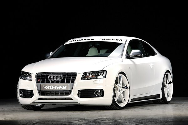 Lovely white audi on black background