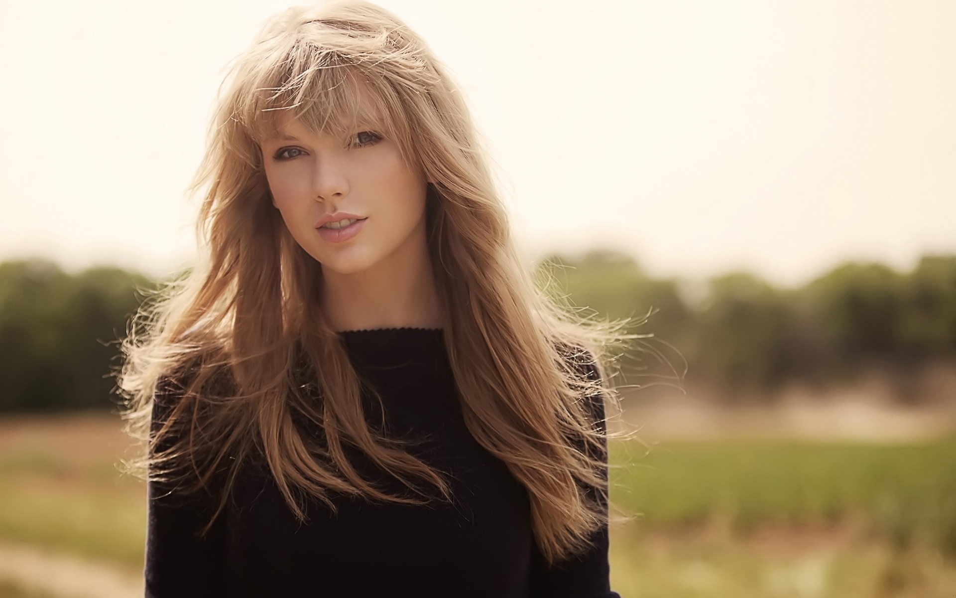 viso capelli sfondo cantante vista sole bionda taylor swift