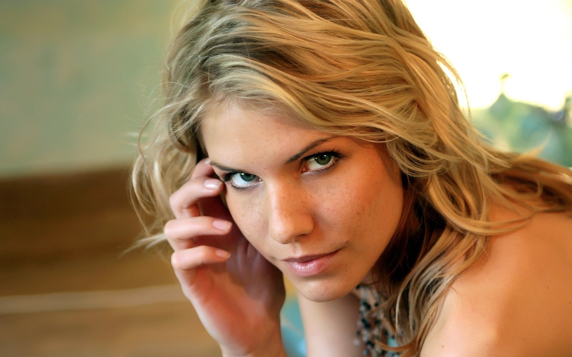 a woman sexy girl playmate beauty close up blonde grey face