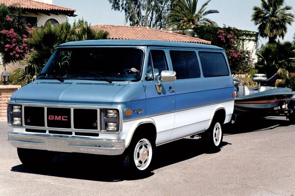 An old retro van from 1985 on a sunny street