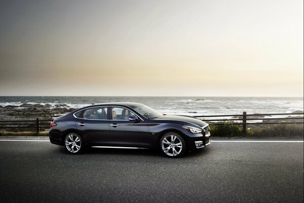 Black Infinity Q701 car on the coast background