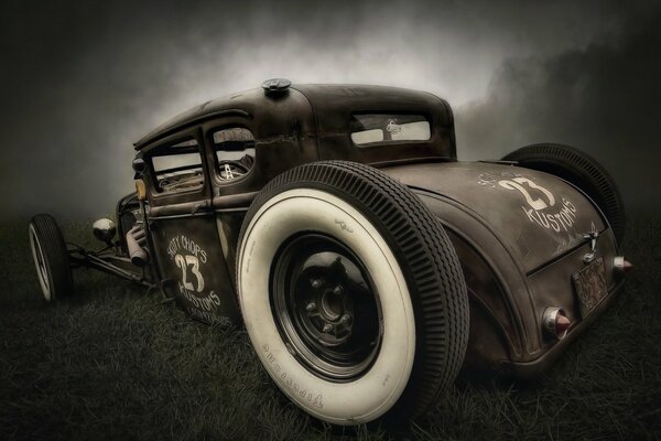 Vintage car in a gloomy park