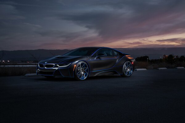 BMW sports car at sunset