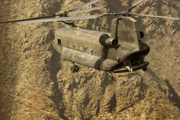 A military aircraft disguised as the color of a mountain