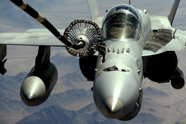 View of a military aircraft from the bow of the ship