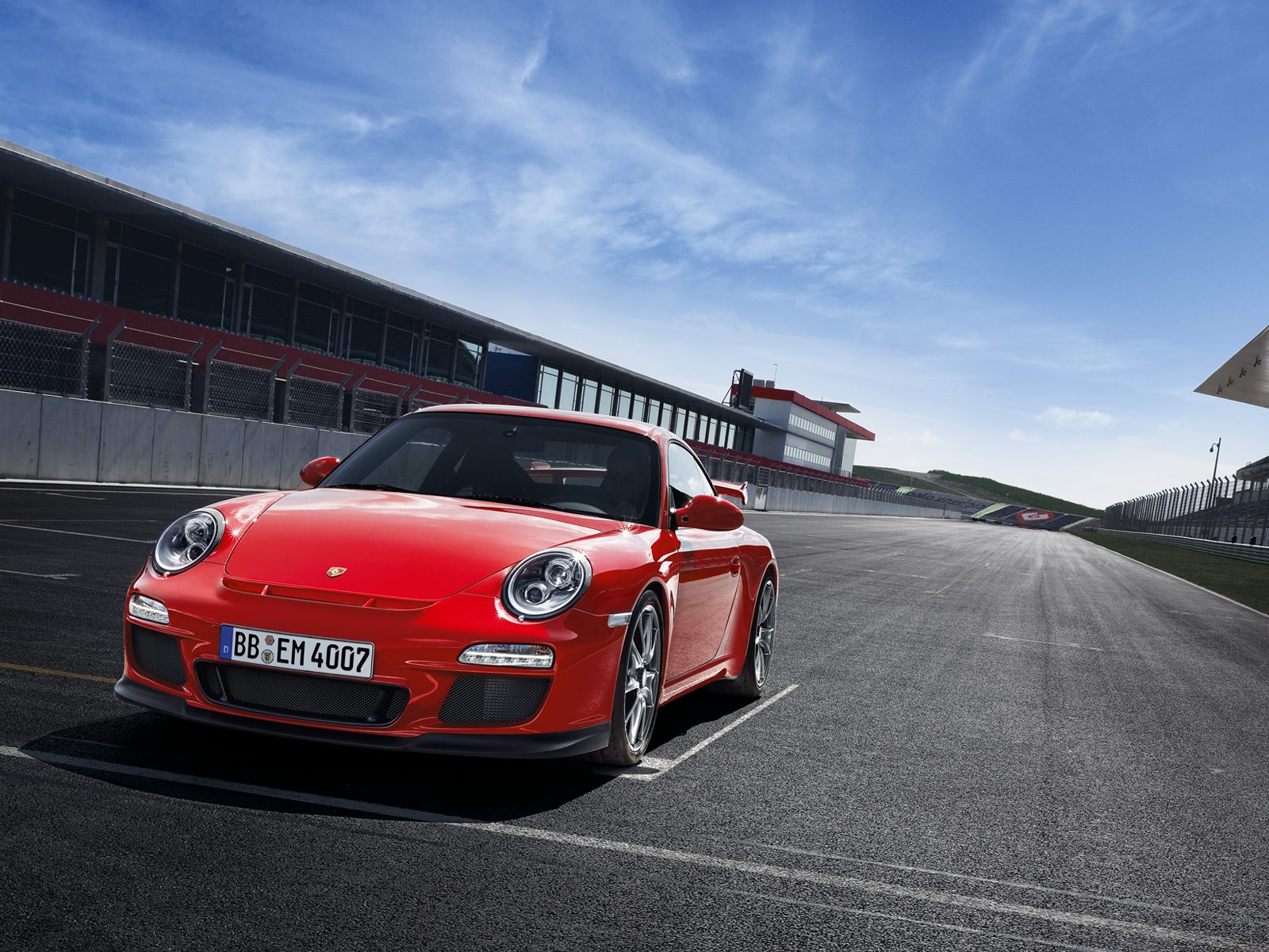 porsche 911 gt3 tor salon czerwony start samochód sportowy asfalt