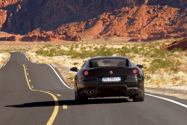 Ferrari 599gtb in the desert USA rear view